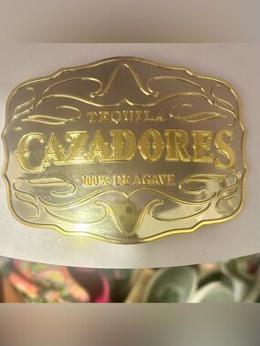 Tequila Cazadores  100% De Agave Gold Embossed belt buckle.